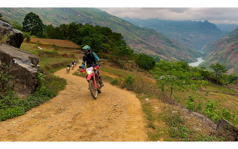 This Northern Vietnam Motorbike Tour Hanoi  offers  full chances to discover Ha Giang, Ba Be National Park, Ba Be lake, Mai Chau valley and Sa pa… They are the most attractive destinations in North Vietnam.You will have a great album of stunning landscapes of mountainous regions and colorful hill tribes as an 8 day riding motorbike in northern Vietnam with an experienced local team of Vietnam Motorbike Trips. This is one of our pick of the Vietnam Motorcycle Tour Collection.Day 1:  Hanoi  – Ba Be Lake: 240 km This great Northern Vietnam Motorbike Tour up north of Vietnam starts at around 8 am. We try our best to avoid busy city roads in the morning until Cho Chu town( in Thai Nguyen province) where we have lunch. After lunch, we surely have an enjoyable motorcycle ride to Ba Be because the roads have less traffic and give you a lot of grand mountain views. At about 4 PM. We arrived at Pac Ngoi – a beautiful village of Tay people which is located peacefully at Ba Be lake’s side. Dinner and stay with Tay's family. Day 2:  Babe Lake  –  Meo Vac:   170 km Saying goodbye to  the family, we’ll ride bikes on the back-roads through some rustic villages and the jungle. Then we bike across some streams. This promises to be a great day for off-road Vietnam bike touring.We will stop in Bao Lac town for lunch and then continue the beautiful bike tour from Northern Vietnam to Meo Vac by taking a scenic route that climbs over many Passes where we can enjoy beautiful mountain ranges and the Nho Que river.  Arrive at Meo Vac by 5.00PM. Have dinner in town, and Hotel stay. Day 3: Meo Vac  –  Ha Giang:   180 Km Today’s ride promises to be the highlight of this motorcycle trip in north Vietnam as we will visit one of the most remote land in Vietnam where we can see many ethnic groups with their unique cultures and imposing mountains such as : Pi Leng Pass – one of the 4 longest and most beautiful passes in North Vietnam, the Rock Plateau, the Vuong palace in Dong Van, The “Heaven Gate” in Quan Ba. This is for sure the best bike ride in Vietnam with many interesting and amazing things in every meter of the road.  I Arrived in Ha Giang in the late afternoon.Dinner and stay with the other Tay’s family or stay in hotel in Ha Giang cityDay 4: Ha Giang   –   Sa Pa:   220km Today we head straight towards the North-western mountain where the main Fanxipan Mountain range dominates the road until Sapa. The road is very smooth with a good view of green mountain, rice fields between lovely villages of the hill tribes. After a short break in Lao Cai to see the Chinese border, we will have a very beautiful motorbike ride up to Sapa. This bike ride is up and up till 1.600 meters above sea level. It offers a great  view of the mountain with terrace fields and it must be one of the best bike rides in North Vietnam.Arrive in Sapa at around 5: 00 pm, overnight at a hotel in Sapa.Day 5:  Sapa   –  Mu Cang Chai:   150 kmYou are free to explore Sapa until 1.00PM, check out the hotel and we continue the route to Than Uyen, we will make a splendid climb up from Sapa to the top of the highest road pass in Vietnam (Tram Ton Pass). Crossing into Lai Chau Province at over 2000 m above sea level. This is a short motorbike ride but could be the most enjoyable bike tour from Sa pa. The ride offers you an amazing view of the Hoang Lien mountain ranges for miles and miles. We arrive in Mu Cang Chai by 5.00PM,Dinner and overnight in a hotel or doing home-stay with the Tay family.Day 6: Mu Cang Chai –  Phu Yen:    190 km We keep riding up and down into a forested and high mountain region populated by H’mong peoples. We will hike up a very high mountain pass before descending into a mountainous tea-growing region. Soon after we followed along the valley floor covered in a sea of rice surrounded by Hmong and Thai’s villages all the way to Phu Yen. Especially after lunch in Tu Le – a famous land for terrace fields so the ride through the villages and rice terraces. This is another highlight of this bike tour in North Vietnam.Arrive at Phu Yen town at 5:00Pm. Overnight at the hotel.Day 7: Phu Yen – Mai Chau Valley    160 km It is a short bike tour to Mai Chau valley, but it’s also an enjoyable motorbike ride! It offers some different views from the days before with different hill tribes. Right after Phu Yen town, we will have a great ride along the Da River lake on the winding road between the river lake and mountains. It is likely a bike tour on the coastline in central Vietnam.  After crossing the Da river by a ferry, we will bike up and up to Moc Chau plateau where we stop for lunch. After lunch, we’ll make a turn to the quiet mountain road named Hua Tat – it’s built by the French during the war time and nowadays, it seems like a forgotten place, so the short ride to Mai Chau is also the best part of the Northern Vietnam bike Tour.I Arrived at Mai Chau at 4:30 PM. Stay in Poom-coong village of the Thai people – Home stay.Day 8: Mai Chau – Hanoi. – 170km Having a short walk around the villages of the Thai people in the morning, feel the peaceful life of the locals by walking around the valley and then start the bike ride back to Hanoi at around 9 AM. After 2 beautiful mountain passes – Thung Khe and Doc Cun we will have lunch and then join the highway back to Hanoi. We will be back to the hotel before rush hours in order to end our 8 Day bike tour in north Vietnam.